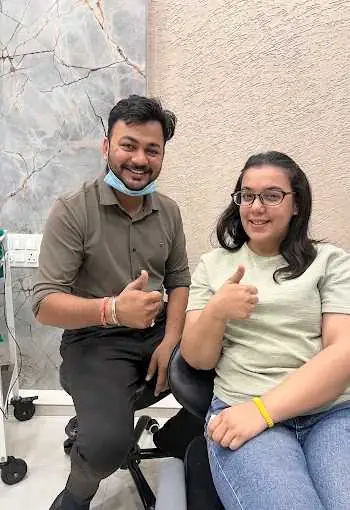 happy patient after dental treatment ahmedabad