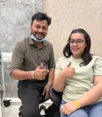 happy patient after dental treatment ahmedabad