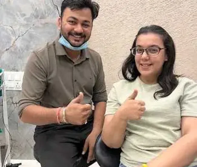 happy patient after dental treatment ahmedabad